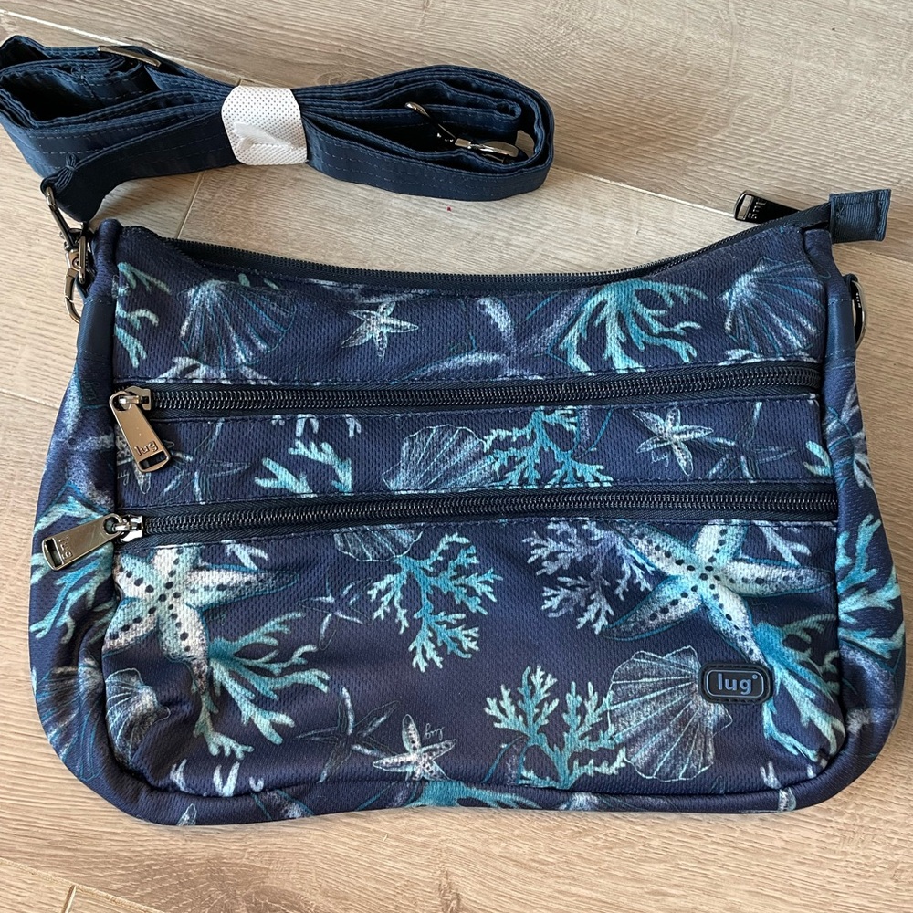 EUC Lug slider freestyle in stars and shells navy